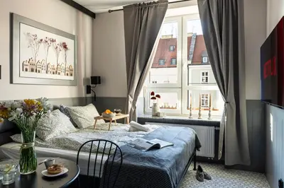 Łóżko lub łóżka w pokoju w obiekcie Świdnicka Grey Studio