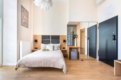 Łóżko lub łóżka w pokoju w obiekcie Apartamenty RentToGo - Bulwar Staromiejski