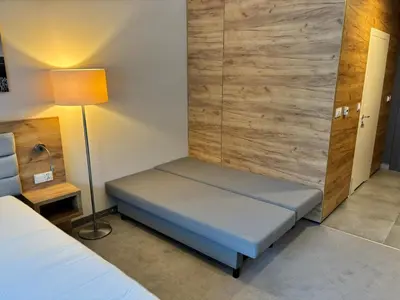 Łóżko lub łóżka w pokoju w obiekcie Czarna Góra Apartament 126
