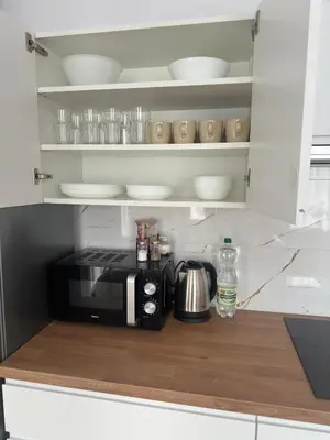 Kuchnia lub aneks kuchenny w obiekcie Apartament SŁONECZNY
