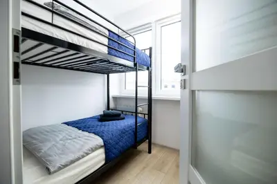 Łóżko lub łóżka w pokoju w obiekcie Apartament Stacja Komfort