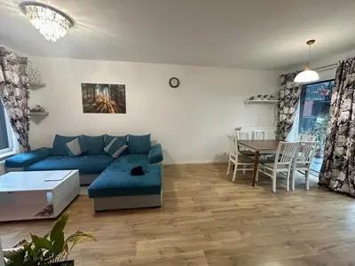 Część wypoczynkowa w obiekcie Słoneczne Mieszkanie na Parterze z Ogrodem