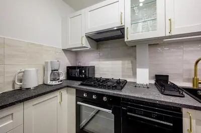 Kuchnia lub aneks kuchenny w obiekcie RentPlanet - Studio Pereca