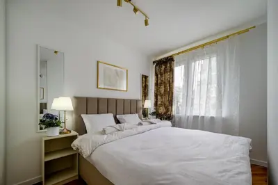 Łóżko lub łóżka w pokoju w obiekcie RentPlanet - Studio Pereca