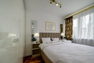 Łóżko lub łóżka w pokoju w obiekcie RentPlanet - Studio Pereca