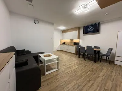 Telewizja i/lub zestaw kina domowego w obiekcie Apartamenty w Kotlinie