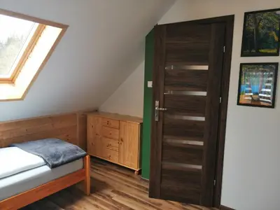 Łóżko lub łóżka w pokoju w obiekcie Domek na wyłączność Stronie Śląskie Nowy Gierałtów