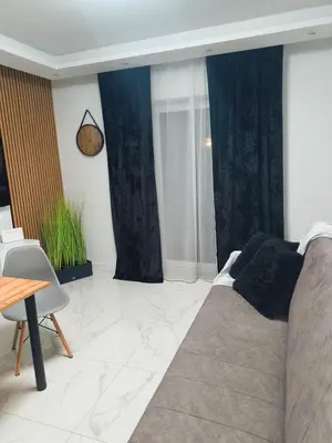 Część wypoczynkowa w obiekcie Aura Apartamenty 3