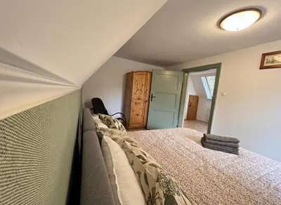 Łóżko lub łóżka w pokoju w obiekcie Gawra Bogusza
