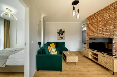 Część wypoczynkowa w obiekcie RentPlanet - Apartament Jedności Narodowej II