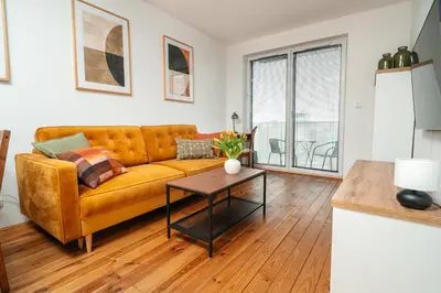 Część wypoczynkowa w obiekcie Miedziana - Apartament z balkonem, miejscem do pracy, wi-fi - Wrocław - Fair Rentals