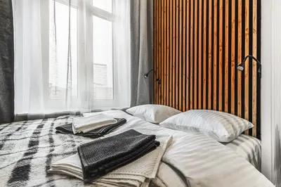 Łóżko lub łóżka w pokoju w obiekcie Wyjątkowe Miejsce w Sercu Wrocławia