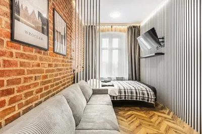Łóżko lub łóżka w pokoju w obiekcie Wyjątkowe Miejsce w Sercu Wrocławia