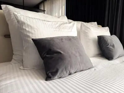 Łóżko lub łóżka w pokoju w obiekcie Hotel AP