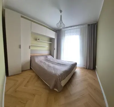 Łóżko lub łóżka w pokoju w obiekcie Melisowa Apartment Wrocław