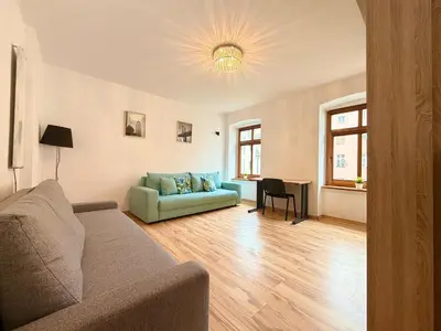 Część wypoczynkowa w obiekcie Rynek Wrocław Apartment for 8 People by BookingHost