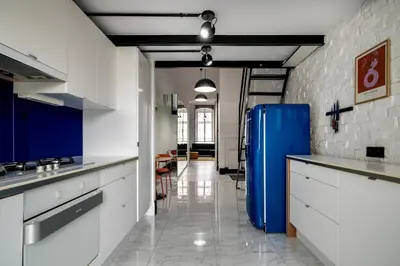 Kuchnia lub aneks kuchenny w obiekcie RentPlanet - Studio Lelewela