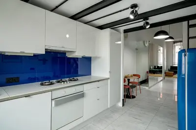 Kuchnia lub aneks kuchenny w obiekcie RentPlanet - Studio Lelewela