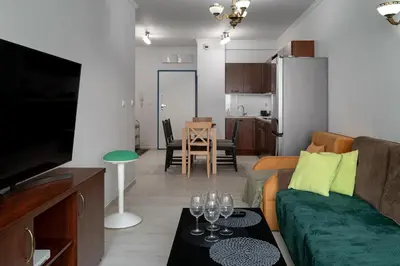 Telewizja i/lub zestaw kina domowego w obiekcie RentPlanet - Apartament Pomorska