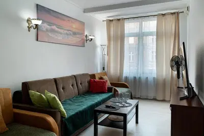 Część wypoczynkowa w obiekcie RentPlanet - Apartament Pomorska