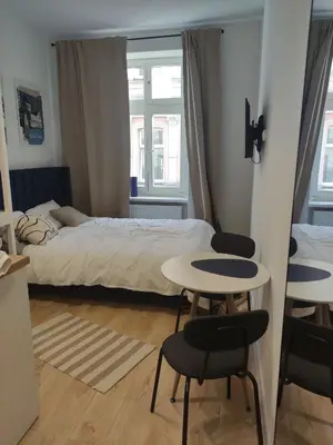 Łóżko lub łóżka w pokoju w obiekcie Tara Stay