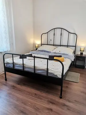 Łóżko lub łóżka w pokoju w obiekcie Apartament dla Cyfrowych Nomadów z miejscem pracy