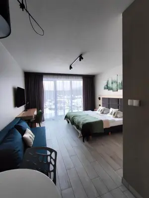 Łóżko lub łóżka w pokoju w obiekcie Apartament Czarna Góra Ischgl 13 z widokiem na góry