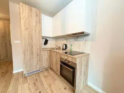 Kuchnia lub aneks kuchenny w obiekcie Legnicka Residence Apartment by BookingHost