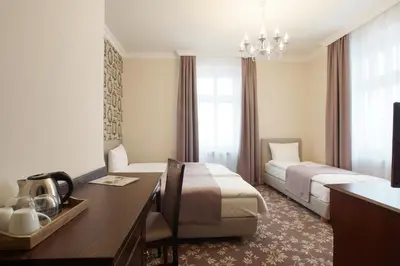 Łóżko lub łóżka w pokoju w obiekcie Villa La Pierre