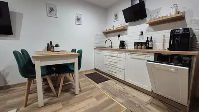 Kuchnia lub aneks kuchenny w obiekcie Hortensjowe Zacisze