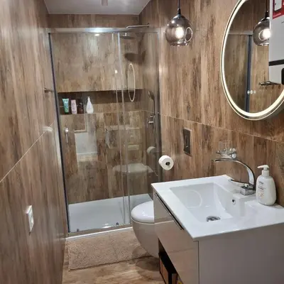 Łazienka w obiekcie Przytulny Apartament Lelewela 2