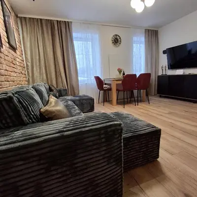 Telewizja i/lub zestaw kina domowego w obiekcie Przytulny Apartament Lelewela 2