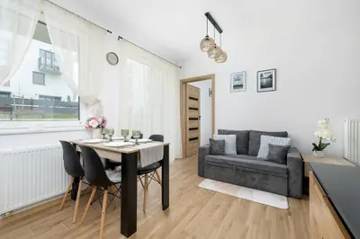 Część wypoczynkowa w obiekcie Elegant Apartment in Gliwice with Garden Desk and Parking by Noclegi Renters