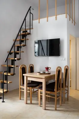 Telewizja i/lub zestaw kina domowego w obiekcie ProperUNIT Old Town Loft Apartment with Balcony