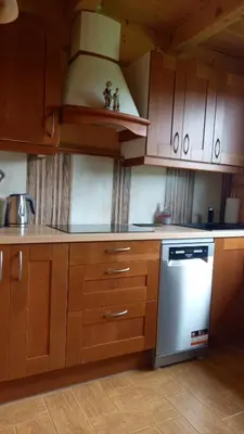 Kuchnia lub aneks kuchenny w obiekcie Domek jak z bajki - stylowy domek z bali z kominkiem