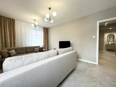 Telewizja i/lub zestaw kina domowego w obiekcie 1 Maja Apartment - Self check-in 20h - 300m Train Station