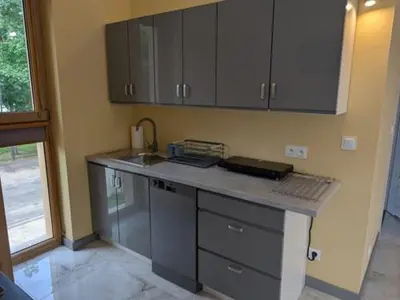 Kuchnia lub aneks kuchenny w obiekcie Apartamenty Biwakowa 4B
