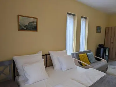 Łóżko lub łóżka w pokoju w obiekcie Apartamenty Biwakowa 4B