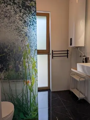 Łazienka w obiekcie Apartamenty Biwakowa 4B