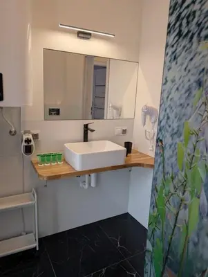 Kuchnia lub aneks kuchenny w obiekcie Apartamenty Biwakowa 4B