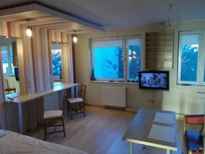 Telewizja i/lub zestaw kina domowego w obiekcie Wood Creek Apartments