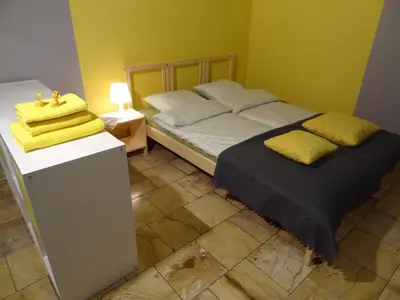 Łóżko lub łóżka w pokoju w obiekcie Apartamenty Polna