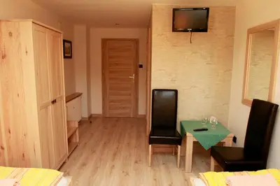 Telewizja i/lub zestaw kina domowego w obiekcie Pensjonat Lido
