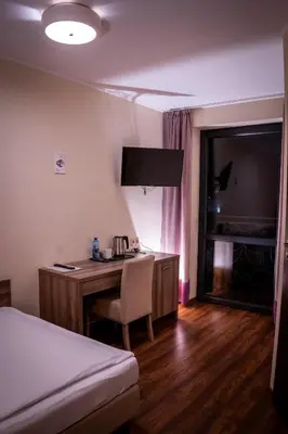 Łóżko lub łóżka w pokoju w obiekcie Zajazd Pod Borem