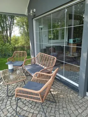 Patio lub wspólna przestrzeń na świeżym powietrzu w obiekcie Mizerówka Guest House