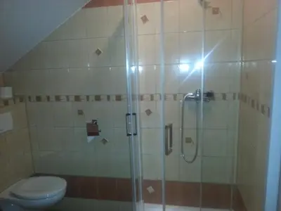 Łazienka w obiekcie Pensjonat Lew Jaskiniowy