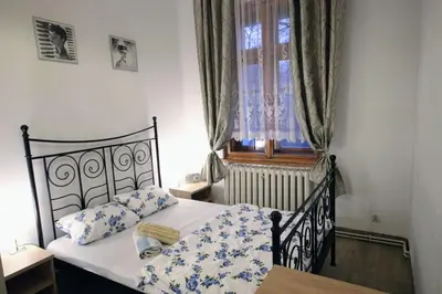 Łóżko lub łóżka w pokoju w obiekcie Ośrodek Wypoczynkowy Radosno