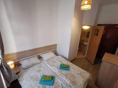 Łóżko lub łóżka w pokoju w obiekcie Ośrodek Wypoczynkowy Radosno