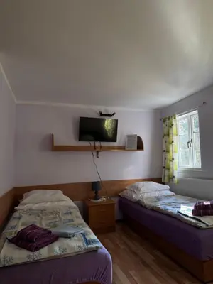 Łóżko lub łóżka w pokoju w obiekcie Rancho Panderoza