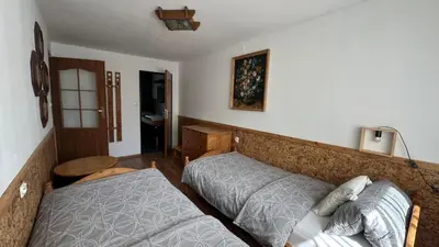Łóżko lub łóżka w pokoju w obiekcie Na Piotrowickiej Przełęczy
